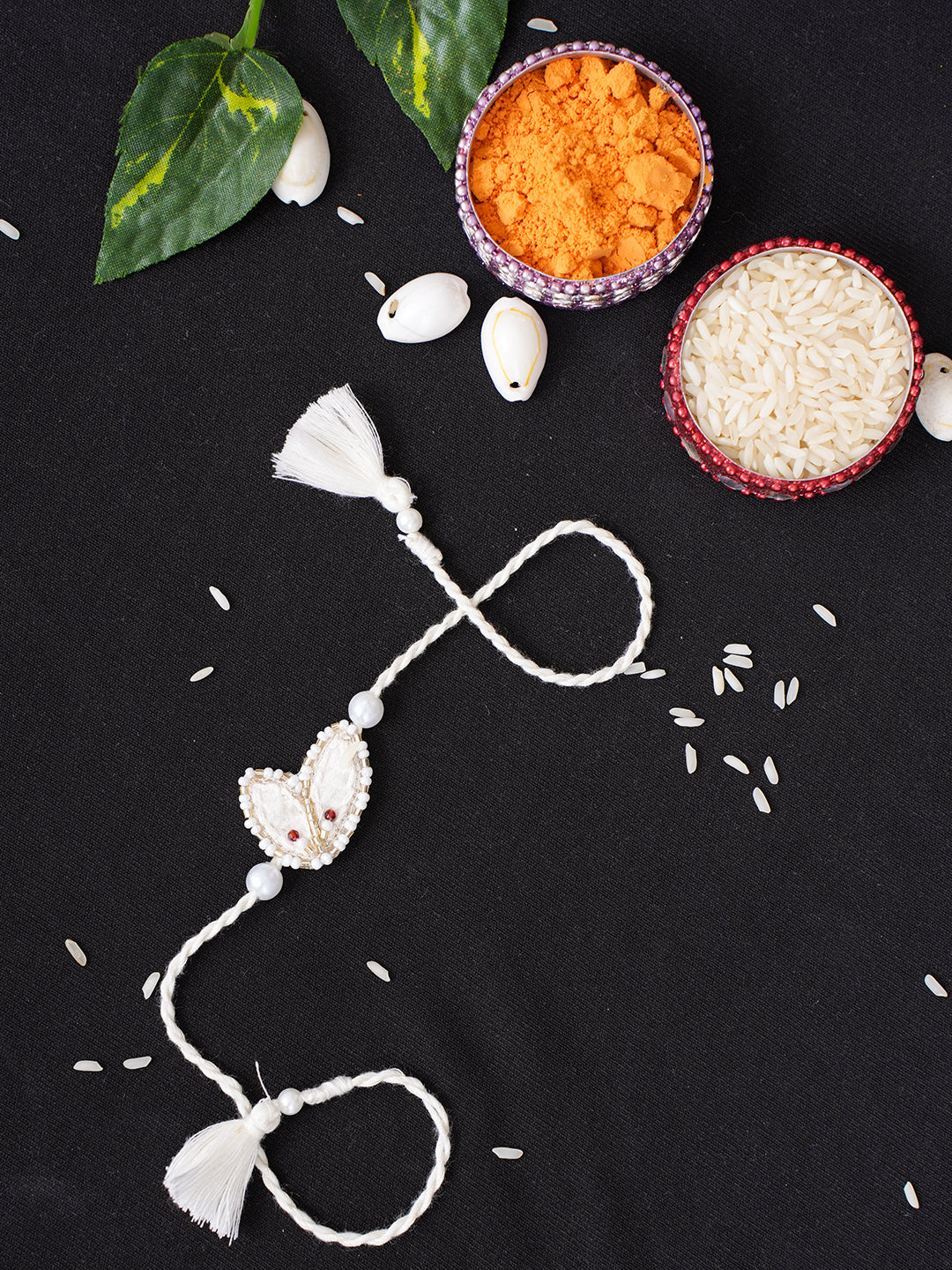 Ada Hand Embroidered Cream Cotton Raksha Sutra Rakhi With Cutdana Work_1