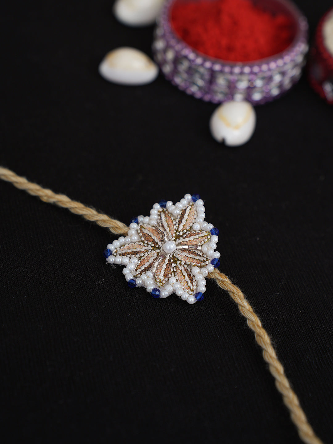 AdaHandEmbroideredFawnRakshaSutraRakhiWithPearlWork08A503330_1