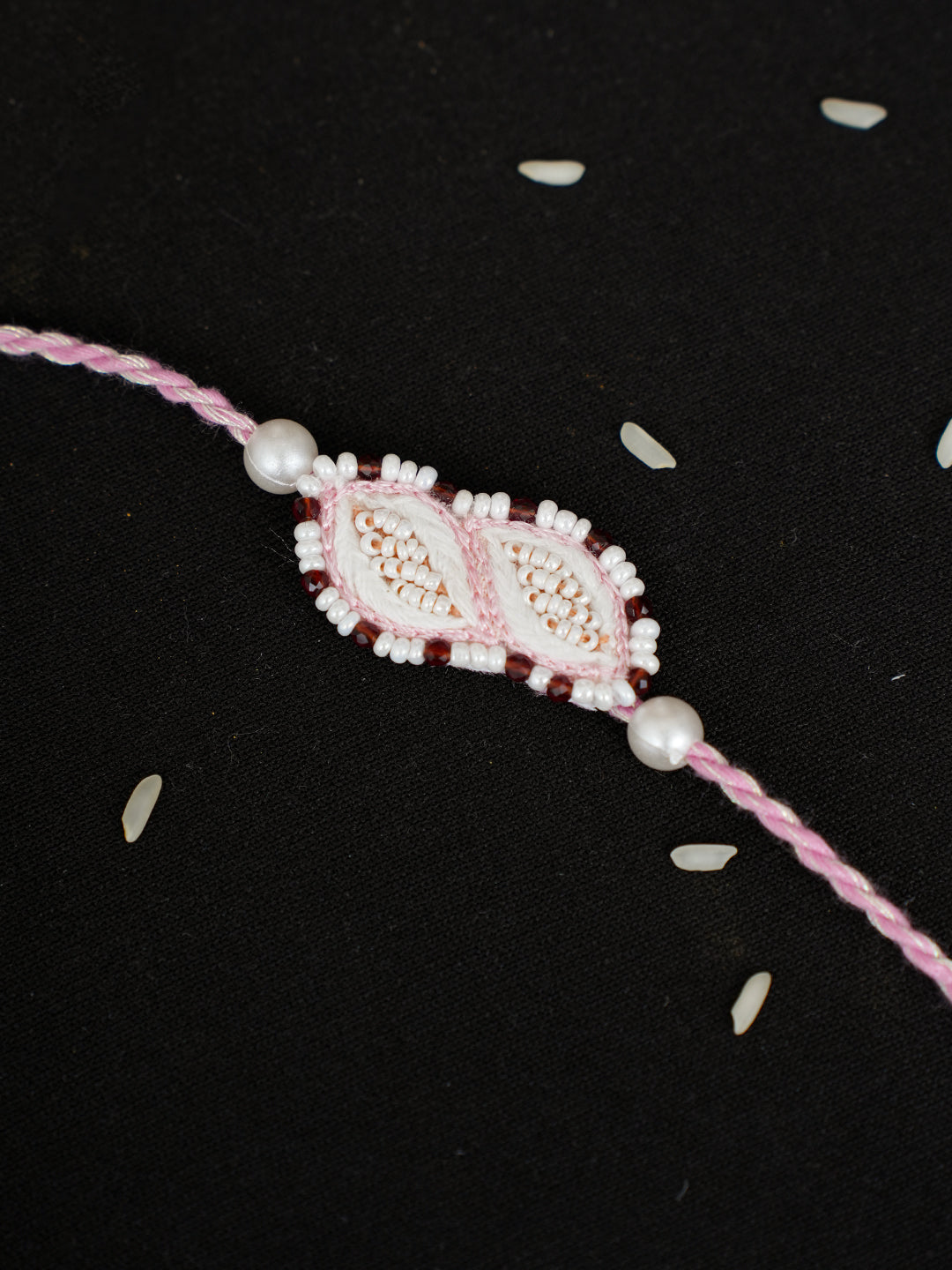 Ada Hand Embroidered Pink Chanderi Raksha Sutra Rakhi With Pearl Work_2