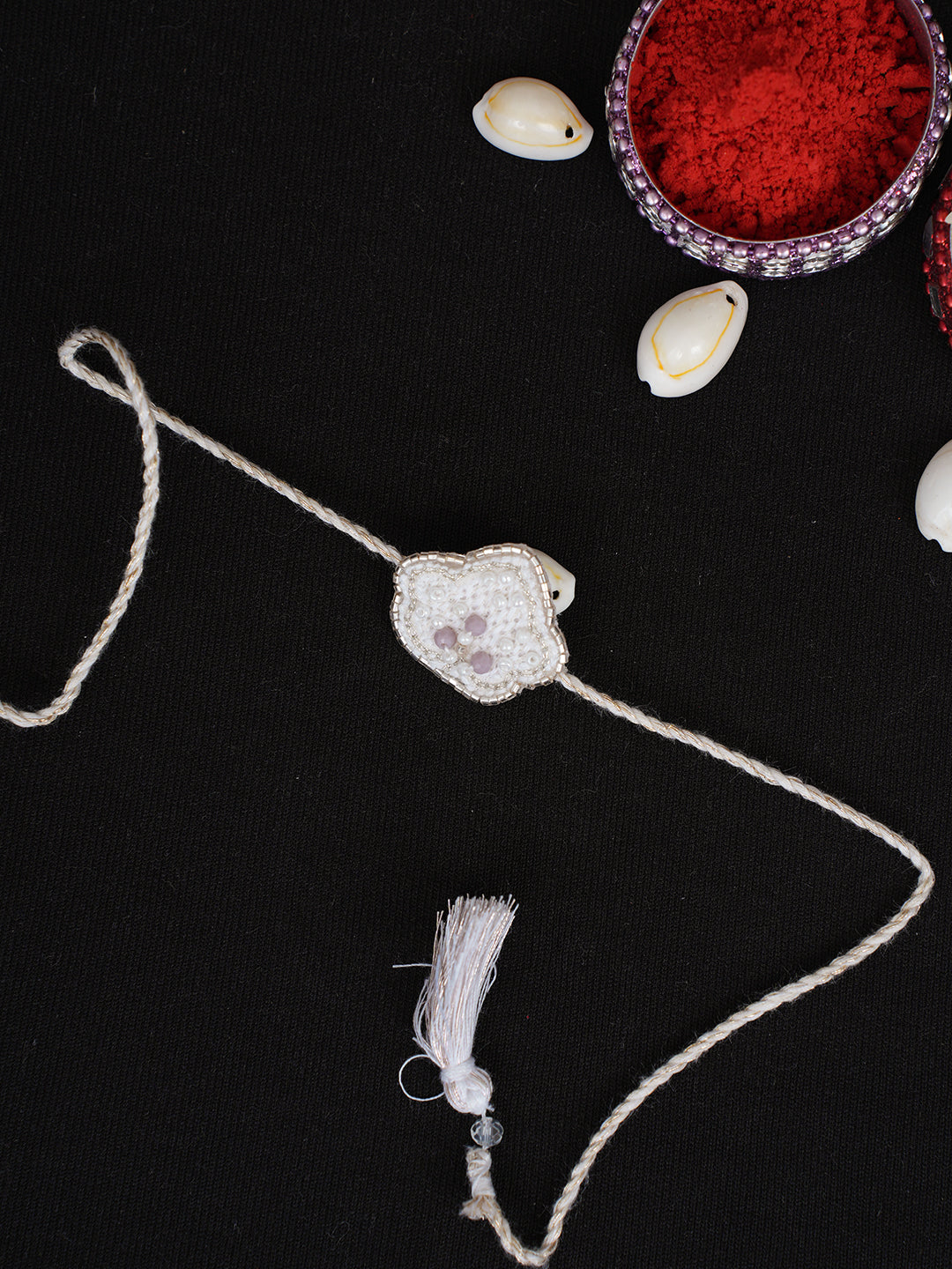 Ada Hand Embroidered White Cotton Raksha Sutra Rakhi With Cutdana Work_1